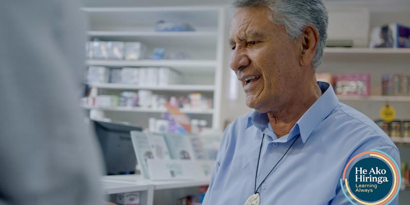 Image of an older Māori man in a pharmacy